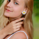 Beautiful Tais flaunts her delectable butt outdoors.