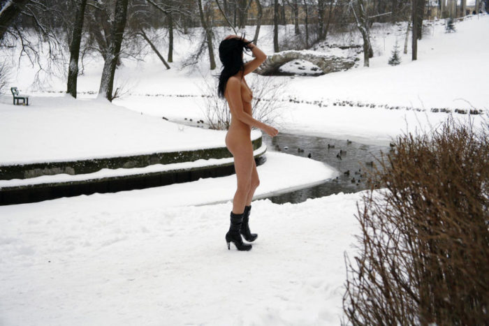 Black-haired girl visits the winter park