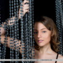 Nikia shows off her nubile body and trimmed pussy.