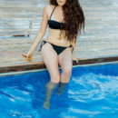 Norma A enjoys a quick dip in the pool before proceeding on showcasing her meaty body