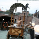 Sweet girl Irina O shows her young body by the city river