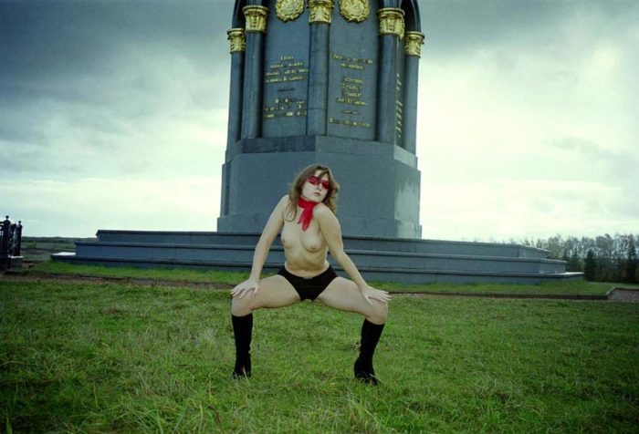 Teen girl Jella takes off panties near monument