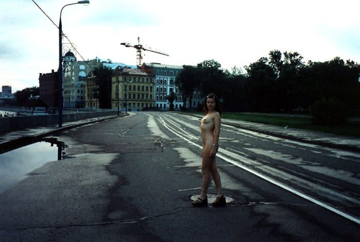 Young girl walks naked at very center of Moscow