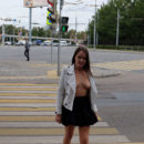 Yummy damsel in a mini skirt on the streets
