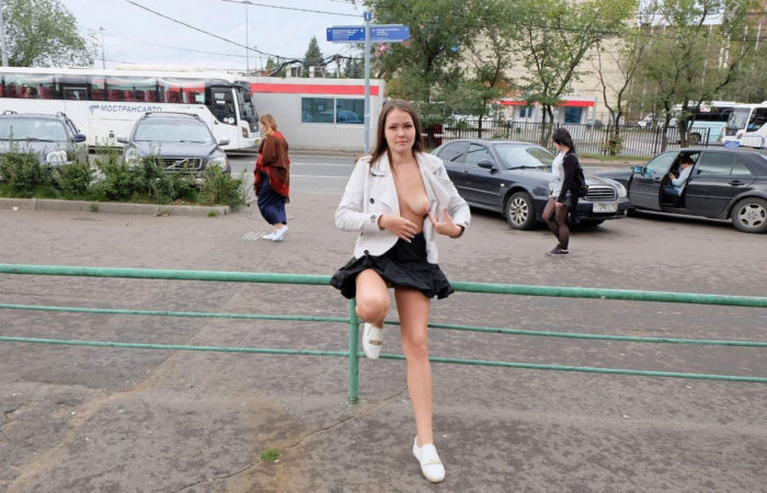 Yummy damsel in a mini skirt on the streets