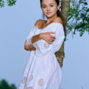 Beautiful Jennifer Hart flaunts her sexy body as she delightfully poses outdoors.