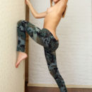 Tiffany playfully poses in her camo leggings before stripping naked to show off her slim physique.