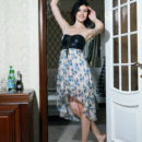 Raven-haired Elizabet slowly and sensual strips of her dainty dress, revealing her silky, smooth body with pink breasts and lickable pussy