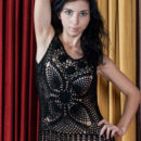 Hot brunette Deja Move on red sofa