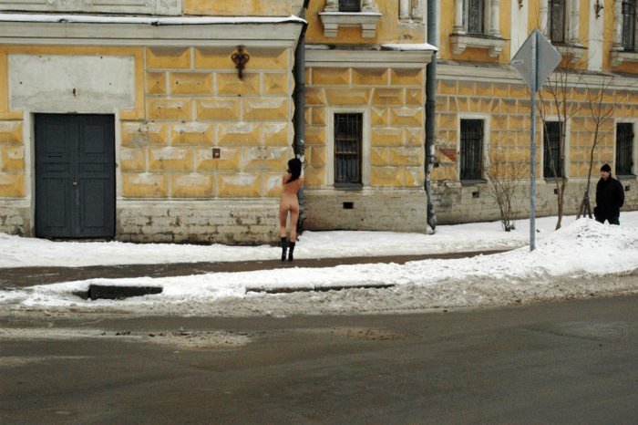 Russian amateur brunette Krista walks at winter streets with no clothes