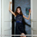 Anna Aki flaunts her slim body with small tits and smooth pussy in front of the camera.