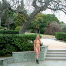 Busty blonde Lena V walkes at public park