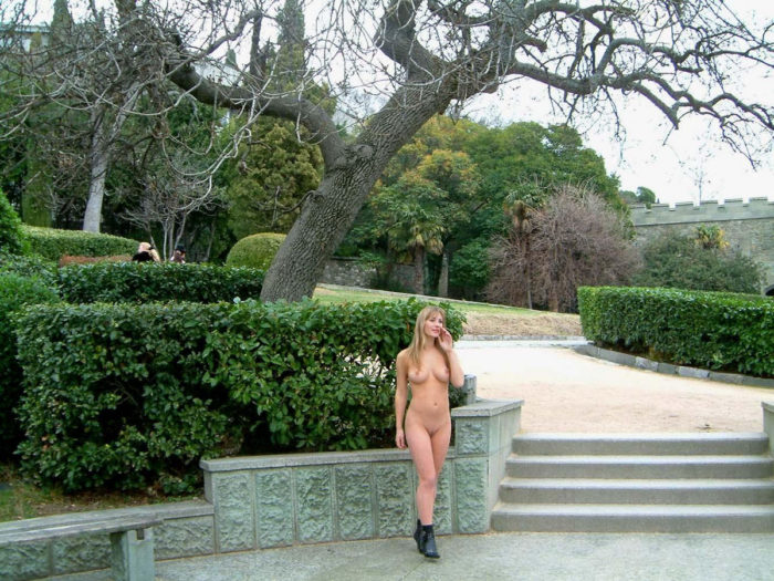 Busty blonde Lena V walkes at public park