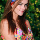 Fernanda strisp her colorful bikini revealing her sexy body as delightfully poses in the outdoors.