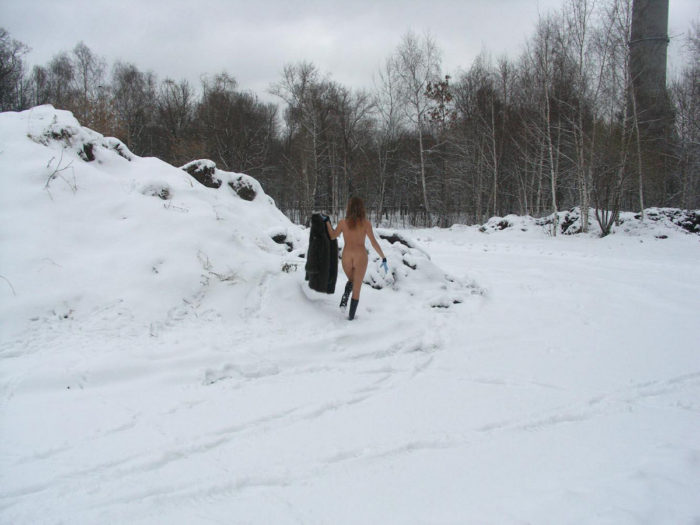 Naked russian girl at winter Moscow park