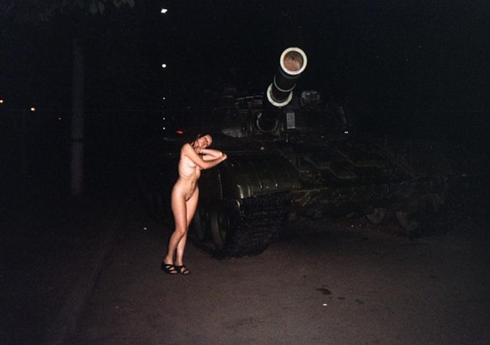 Naked russian teen posing on tanks at Moscow park