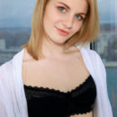 Newcomer Margo Claire strips her sexy black lingerie baring her creamy white body with pink perky nipples and tight butt by the window.