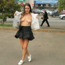 Russian girl Alena walks with no panties in black mini skirt