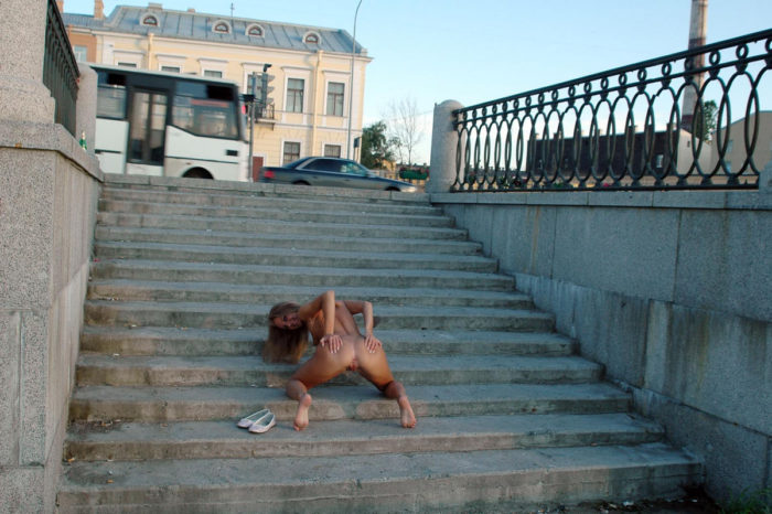 Blonde Nataly S shows all her sweet holes on the street stairs