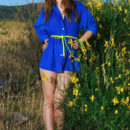 Izabel A strips her blue robe baring her nubile body and poses sensually outdoors.