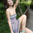 Galina A displays her sweet pussy as she playfully poses in the park.