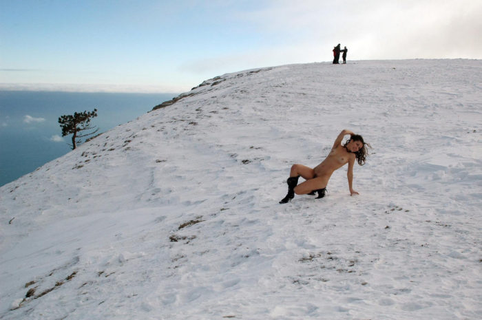 Beautiful russian girl Alexandra B on the mountain top