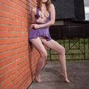 Ginger Frost sensually poses in front of the camera baring her gorgeous   body.