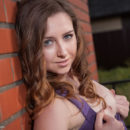 Ginger Frost sensually poses in front of the camera baring her gorgeous   body.