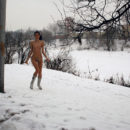 Naked brunette Toma walks naked at winter park