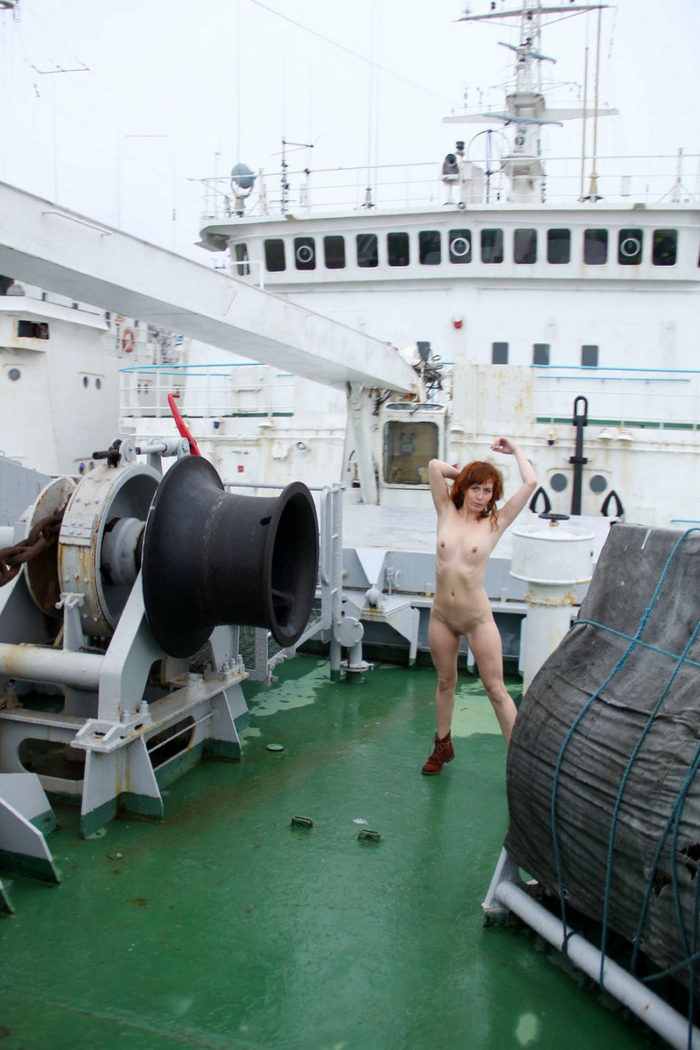 Naked redhead girl Masha on big ship