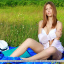New model Alicia Love displays her amazing physique in the meadows.