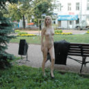 Skinny blonde exhibitionist Julia G at the streets