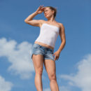 Julia Steel flaunts her sexy, slender body as she poses by the rocks.