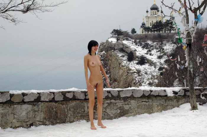 Naked brunette Christina G at winter road