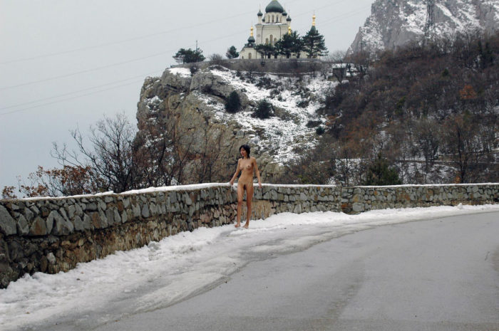 Naked brunette Christina G at winter road