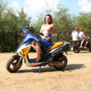 Naked girl Tamara D spreads legs on motorcycle