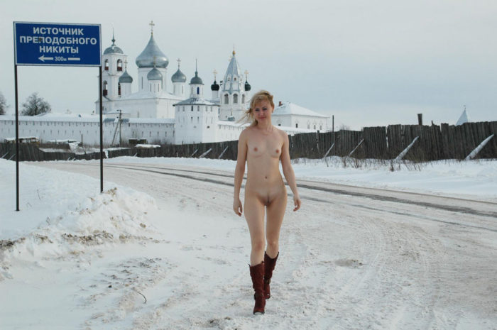 Naked lady Natasha K near the monastery