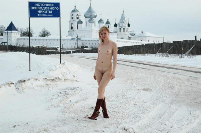 Naked lady Natasha K near the monastery