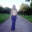Nice blonde in black panties in Moscow park
