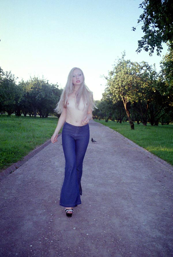 Nice blonde in black panties in Moscow park