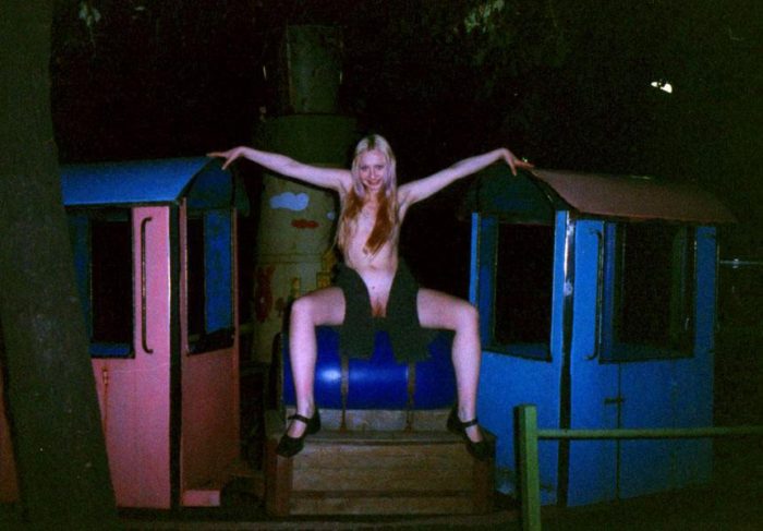 Sweet russian blonde posing on playground