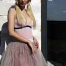 Kira W strips outdoors as she bares her sexy, slender body.