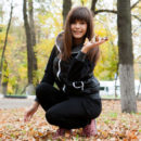 Smiling brunette Zelda B exposes her beautiful pussy