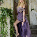 Taking off her flowy purple dress, a vision of the naked goddess Angelika D with smooth porcelain skin and heavenly assets can be captivating to any mere mortal.