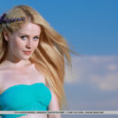 Fay Love s youthful beauty, her smooth porcelain skin, and nubile body stands out in the bright, sunny outdoor.