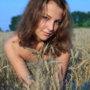 Smiling russian teen Nikia A in the fields