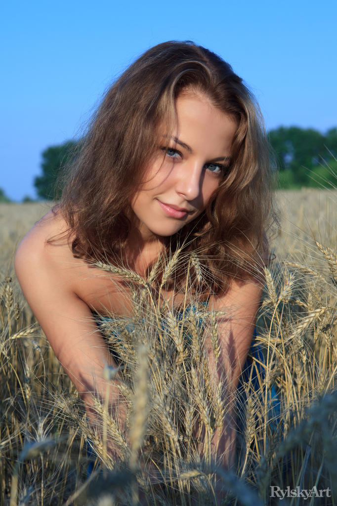 Smiling russian teen Nikia A in the fields