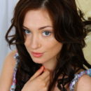 Dark curly hair framing an angelic face with sweet facial features and a hot nubile body, Halena A effortlessly takes our breath away with her irresistibly cute appeal.