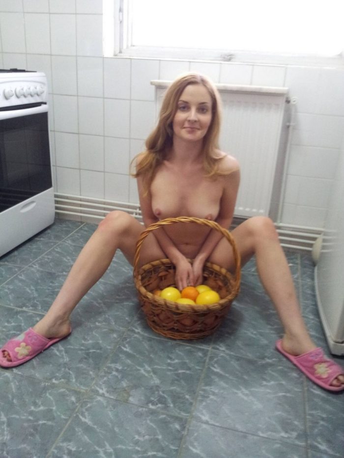Amateur blonde posing naked at home