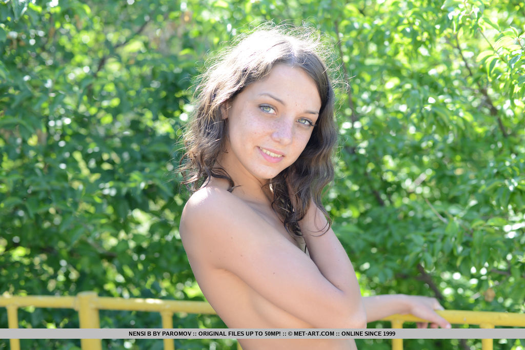 Playful and daring Nensi B makes a stunning nude attraction in the park, baring her petite and slender physique.